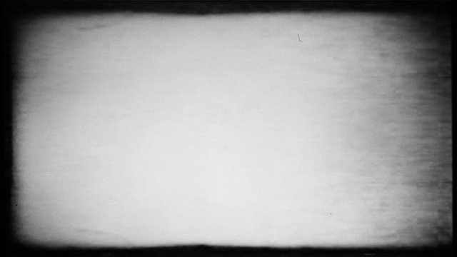Old Film Look Effect 4K. Processed from original 8mm projection. Loops seamlessly. Film grain, noise, dust, scratches and light leaks.