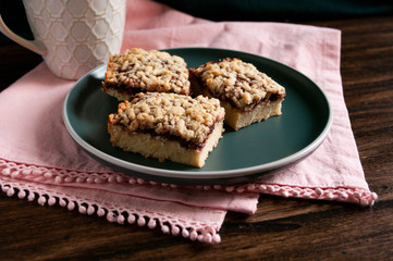 Sweet crumble cake with plum jam slices, home made dessert, bakery. Handmade.