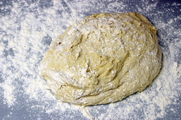 Pastry yeast dough on the grey table