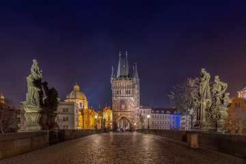 Fototapeta na wymiar Old town bridge tower on Charles Bridge, Prague at night.