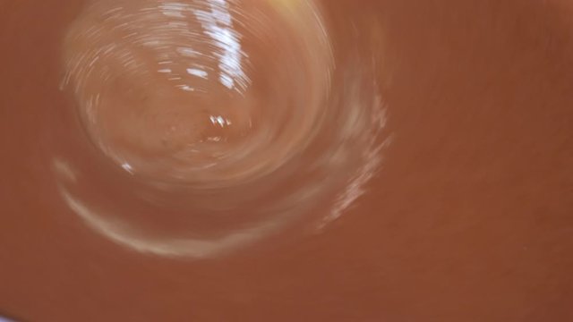 whirlpool of corn wort while making homemade whiskey