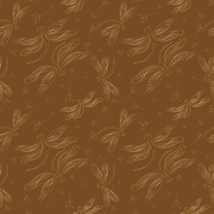 Vector seamless pattern with golden dragonflies on a chocolate background.