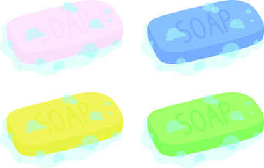 A soapy soap in 4 colors, pink, blue, yellow and green