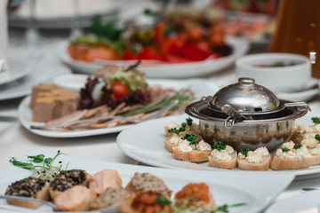 Breads and butter for appetizer. metal plate