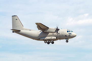 Fototapeta na wymiar Military transport aircraft used to carry freight and troops in cargo operations