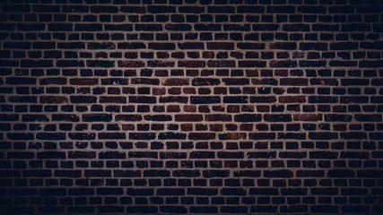 Photo sur Aluminium Mur de briques Texture de mur de brique sombre. Surface de pierre brute. Fond noir ou gris foncé