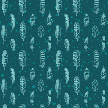 Seamless pattern with hand drawn feathers