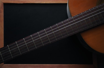 Fototapeta premium Close-up neck and upper bout of acoustic guitar