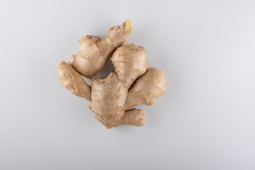 Close-up of ginger root on white background. Shallow dof