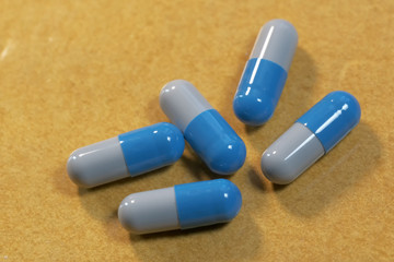 Blue gelatin soluble capsules