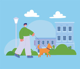 Obraz na płótnie Canvas young man walking with dog pet in the street urban scene