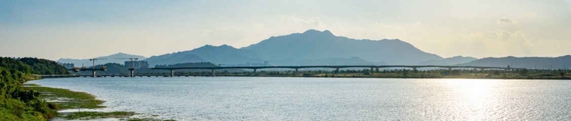 Panoramic view of under construction arch bridge across Nakdonggang river in Yangho-dong, Gumi-Si, Gyeongsangbuk-do, South Korea