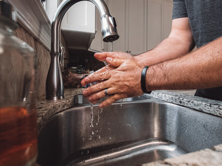 Hand washing with soap and water. Coronavirus prevention by using good hygiene.  Clean, healthy hands.