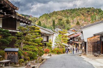 TSUMAGO, JAPAN - NOVEMBER 22: scenic traditional post town in Japan from Edo period on November 22, 2015. Famous Nakasendo trail goes between Magome and Tsumago towns.