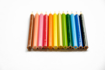 Set of rainbow color wooden pencil for drawing collection isolated on white background. Back view
