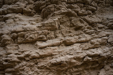 rocks made of stone against the background of the sun