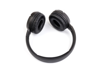 Black wireless headphones on white background.  Advanced acoustic stereo sound system