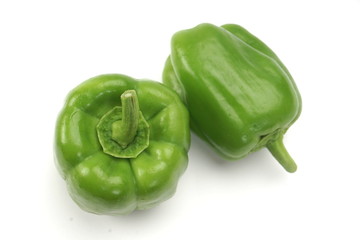 Fresh, green paprika isolated on a white background.