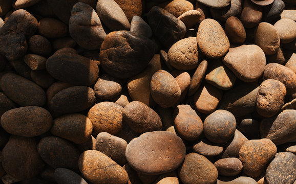 Background of the pavement brown rocks