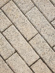 Obraz premium The Background from a gray sidewalk paving slabs