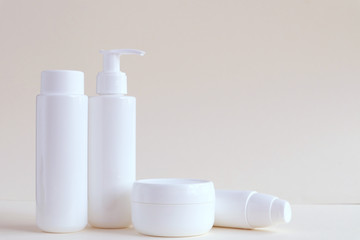 Bottle for cosmetic products without a label. The concept of skin care face.