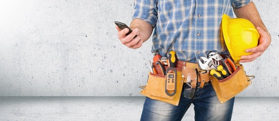 Man worker or professional builder with tools