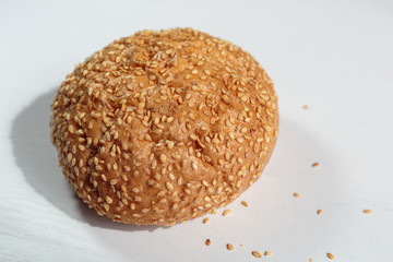 Hamburger bun with sesame seeds.