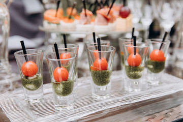 A festive table awaits guests. A variety of salads and cold dishes.