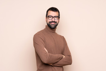 Man over isolated background with glasses and smiling