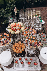 A festive table awaits guests. A variety of salads and cold dishes.