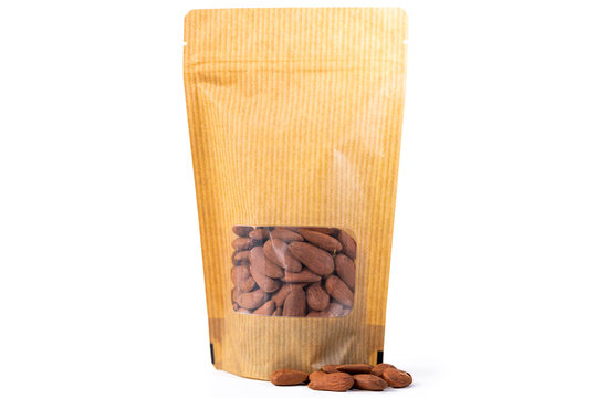 brown paper doypack stand up bio pouch with window zipper on white background filled with rice