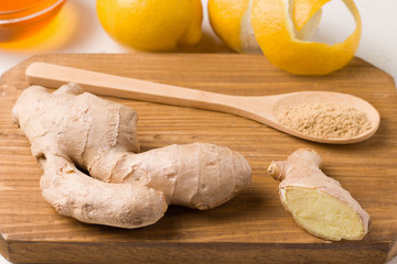 Healthy food. Ginger root on a wooden board
