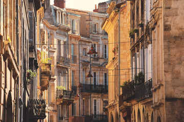 Street view of old town in bordeaux city, typical  buildings from Southwestern of France Europe - obrazy, fototapety, plakaty
