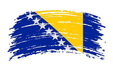 Bosnia and Herzegovina torn flag in grunge brush stroke, vector