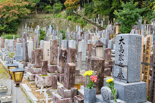 KYOTO, JAPAN - NOVEMBER 11: Higashi Otani cemetery on November 11, 2015 in Kyoto, Japan. It exists since 1671 and is one of most important cemeteries in Japan.