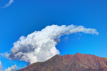 Naklejka na ściany i meble Sky and clouds with ibex form