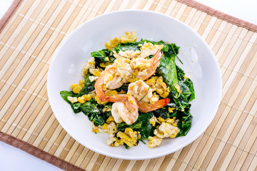Stir-fried Malindjo leaves with egg