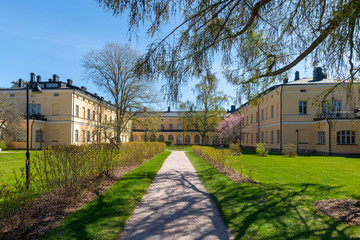 Historical building with beautiful park around it in Helsinki, Finland, with no people.