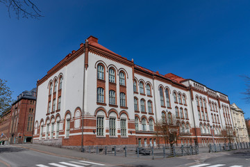 Historical school building in Helsinki spring sunlight with no people in scene