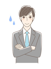 不安・疑問・悩みを感じる正面向きの男性