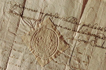 Dry seal with the Poraj coat of arms on a document from AD 1670. Sucha pieczęć z herbem Poraj (jedna z wielu odmian tego herbu) na dokumencie z 1670 roku. - obrazy, fototapety, plakaty
