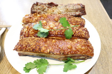 Homemade pork chops, grilled meat on white plate