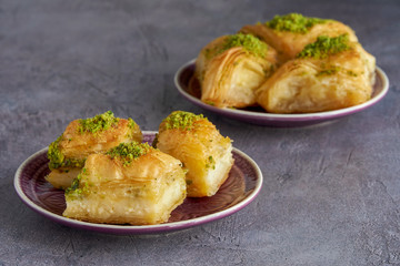 Sweets arabic dessert kunefe, kunafa, knafeh with pistachio and cheese