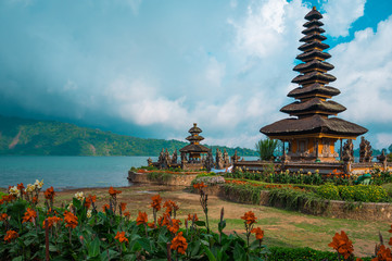 Pura Ulun Danu Bratan temple near Beratan lake in Bali island, Indonesia. Iconic image of Bali and southeast Asia. Travel and adventure background and postcard image.