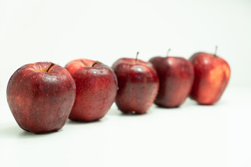 red apples on white background