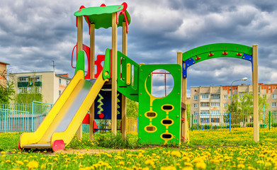 Playground at courtyard in small russian town