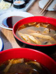 Miso soup in miso bowl with soy sauce