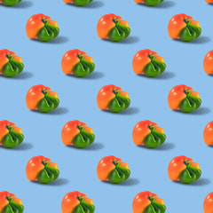 Ugly orange pepper seamless pattern peppers on a blue background