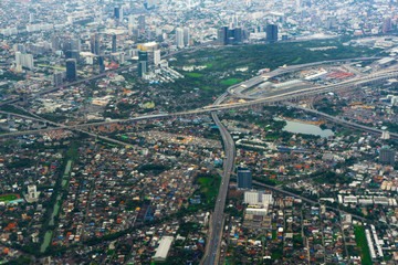 Fototapeta na wymiar aerial airplane window. The top view city