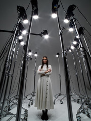 Portrait of a girl in a photo Studio with multiple sources of pulsed light